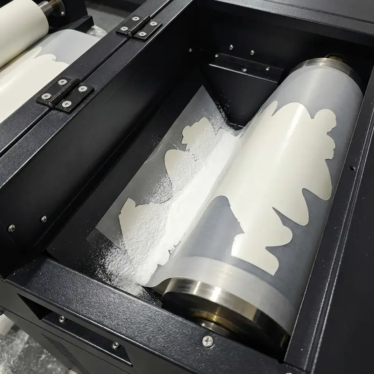 Integrated DTF powder application and curing